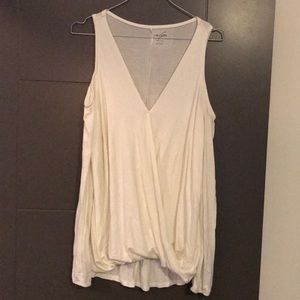 Francesca’s cream cold shoulder wrap top